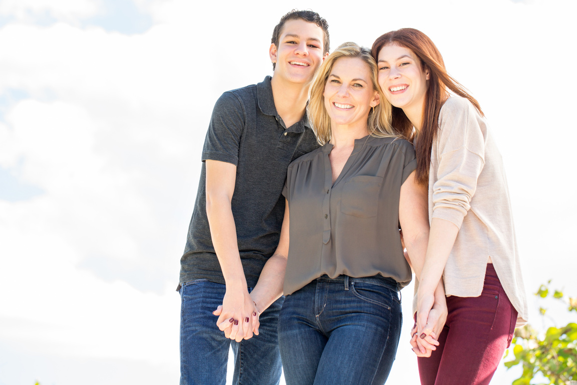 Latin Mother and Her Teenage Children.